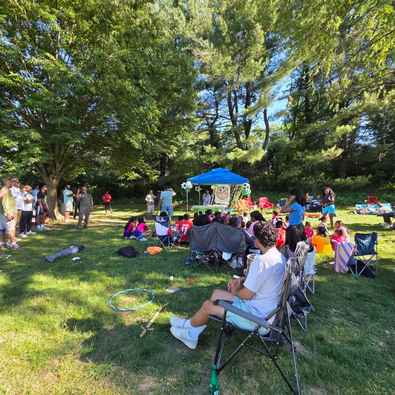 Habesha Youth Club families gathered on the grass at Centennial Park for the 2nd anniversary celebration